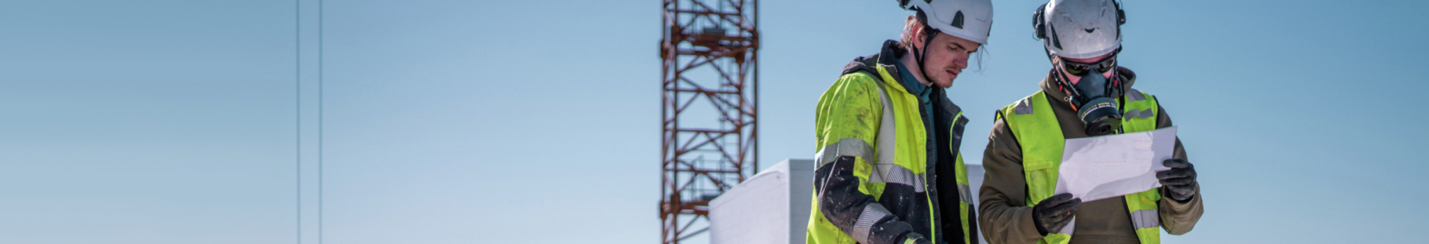 Professional Workplace Scene Two Workers Reviewing Document